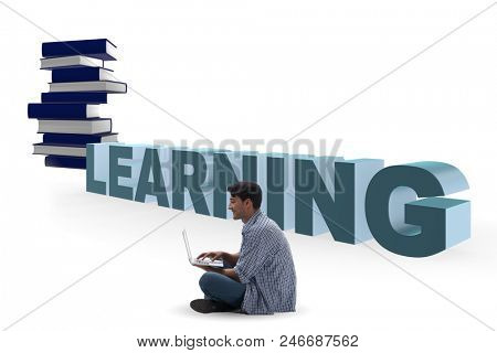 Young man in telelearning concept with laptop and books