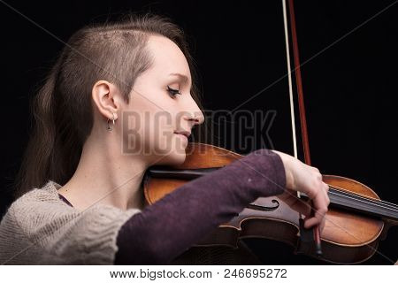 Young Woman Playing Folk Violin