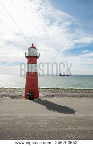 This Lighthouse Is Located In The Netherlands In Westkapelle By The Sea