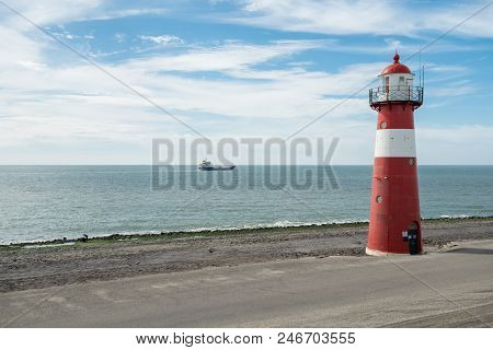 This Lighthouse Is Located In The Netherlands In Westkapelle By The Sea