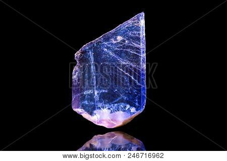 Fluorite Or Fluorspar Mineral In Front Of Black Background, Raw Crystal Specimen