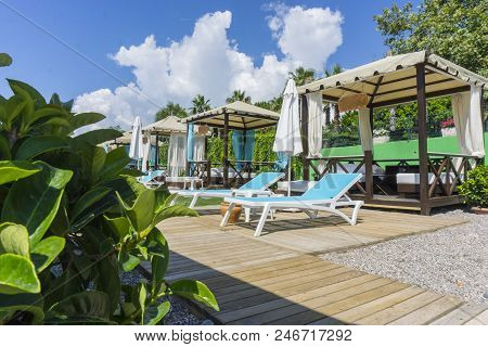 Luxury Beach Tents Canopies On Morning Paradise White Sandy Beach.