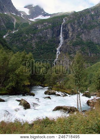 Mountain River And Waterfall Neighborhood Briksdale, Norway