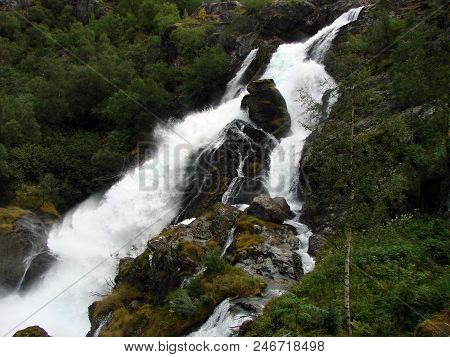 View Of The Mountain And Waterfall Neighborhood Briksdale, Norway