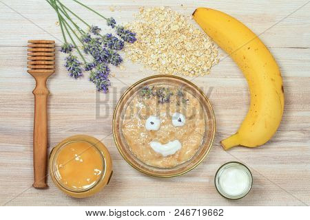 Face Mask From Oatmeal, Yogurt, Banana  And Honey. Ingredients For Homemade Facial Mask Decoreted Wi