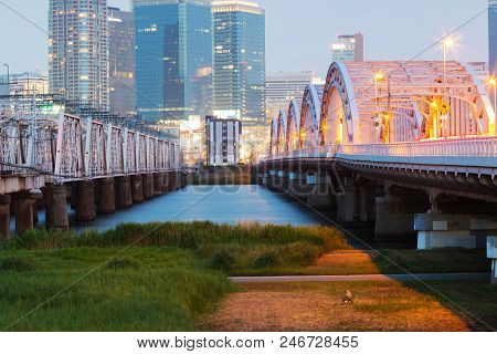 Landscape Of Osaka City At Umeda From Across The Yodogawa River.