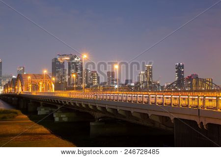 Landscape Of Osaka City At Umeda From Across The Yodogawa River.