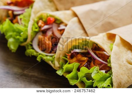 Mexican Burrito With Chicken, Vegetables, Pepper And Beans. Burrithos Takos Food Close Up