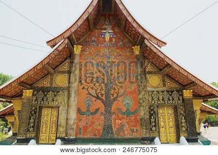 Luang Prabang, Laos - April 14, 2012: Exterior Wall With Beautiful Tree Mosaic Of The Pavilion At Xi