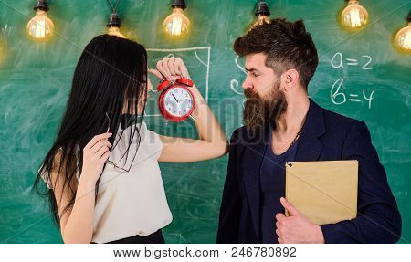 Lady Teacher And Strict Schoolmaster Care About Discipline And Rules In School. School Rules Concept
