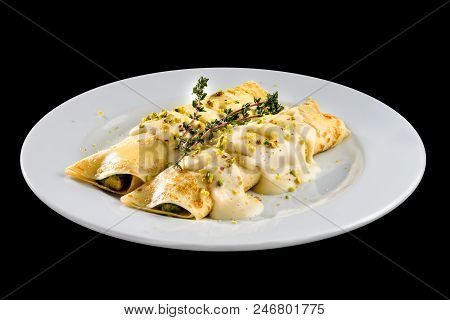 Homemade Tasty Pancakes Blinis Served With Meat And Sauce In The White Plate Isolated On Black Backg