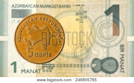 5 Azerbaijani Qepik Coin Against 1 Azerbaijani Manat Bank Note