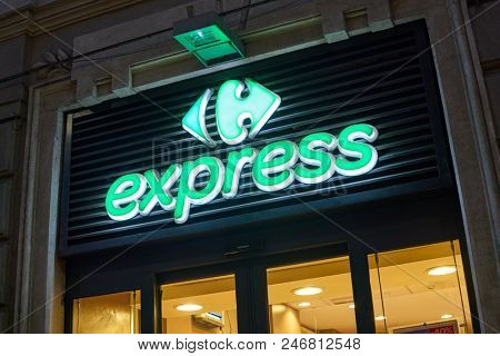 MILAN, ITALY - CIRCA NOVEMBER, 2017: Carrefour Express brand name over a shop entrance in Milan.