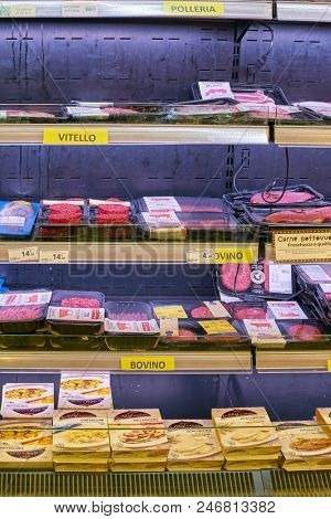 MILAN, ITALY - CIRCA NOVEMBER, 2017: assortment of meat products on display for sale at Carrefour Express in Milan.