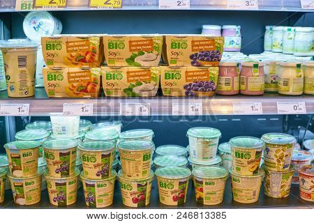 MILAN, ITALY - CIRCA NOVEMBER, 2017: assortment of yogurt on display for sale at Carrefour Express in Milan.