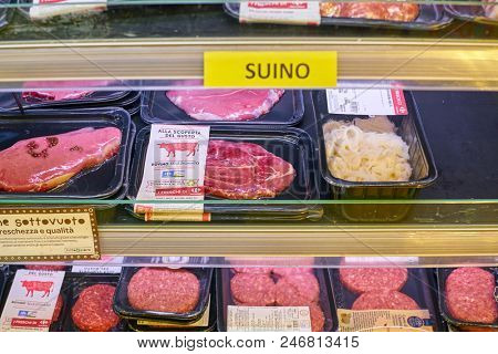 MILAN, ITALY - CIRCA NOVEMBER, 2017: assortment of meat products on display for sale at Carrefour Express in Milan.