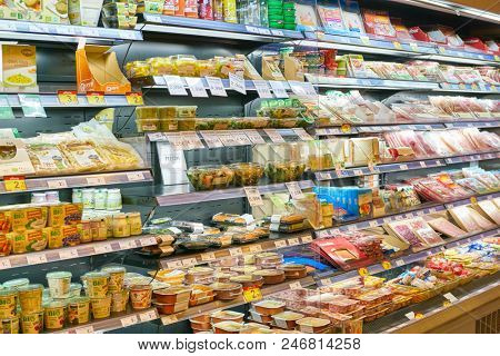 MILAN, ITALY - CIRCA NOVEMBER, 2017: assortment of food on display for sale at Carrefour Express in Milan.