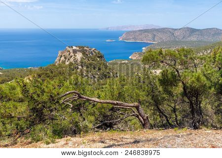 View Of West Coast Of Rhodes Island And Monolithos Castle On The Top Of Hill. Greece