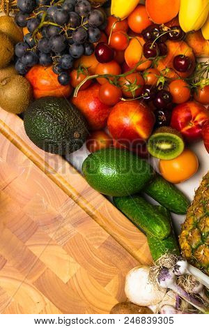 Mediterranean Food Background. Assortment Of Fresh Fruits And Vegetables, Tomatoes, Pineapple, Banan