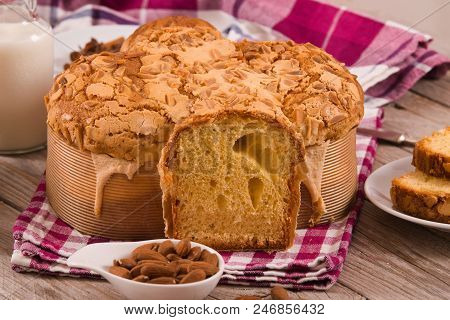 Easter Dove Bread (colomba Pasquale) On Wooden Table.