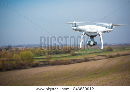 drone quad copter on green corn field