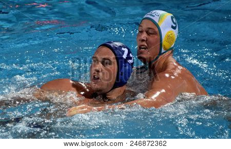 Budapest, Hungary - Jul 17, 2017. HARAI Balazs hungarian waterpolo player (in blue) fights with FORD Andrew (AUS). FINA Waterpolo World Championship was held in Alfred Hajos Swimming Centre.