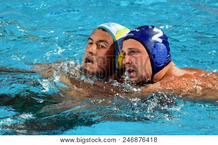 Budapest, Hungary - Jul 17, 2017. TÖRÖK Bela, hungarian waterpolo player (in blue) fights with KAYES Joe (AUS). FINA Waterpolo World Championship was held in Alfred Hajos Swimming Centre.