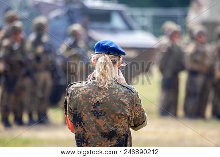 German Soldier Makes A Handy Photo From Soldiers Near Military Vehicles On A Open Day On Day Of The 