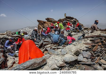 Sierra Nevada, Spain - June 23, 2018: Unidentified Group Of Mountaineers Rest On Top Of Mulhacen, Th