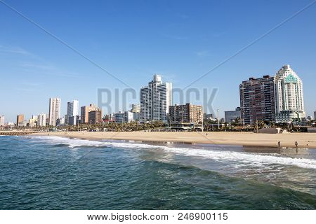 Ocean And Beach Against City Skyline Durban South Africa