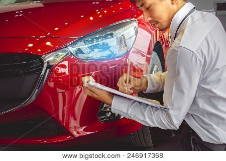 This Career Man Saleman Business Inspection Writing On Notepad Or Book, 
Paper With Car Blurry Backg