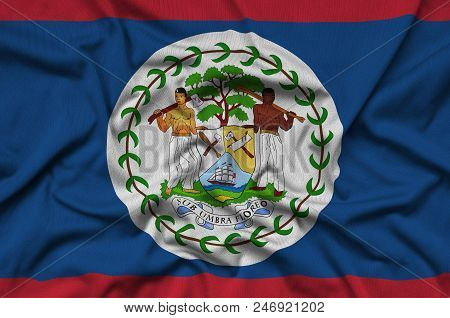 Belize Flag  Is Depicted On A Sports Cloth Fabric With Many Folds. Sport Team Waving Banner