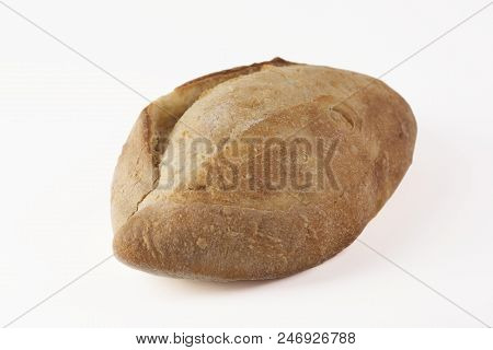 Bekraund. Fresh Bread Loaf On A White Semicircular Shape