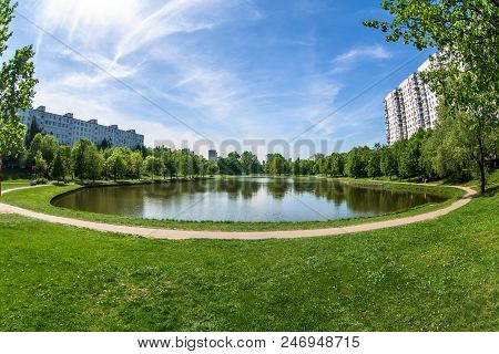 City Public Park With Lake In Summer Day