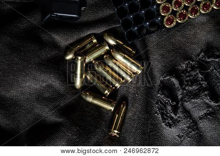 Full Metal Jacket 9Mm Ruger Bullet On Cloth Texture