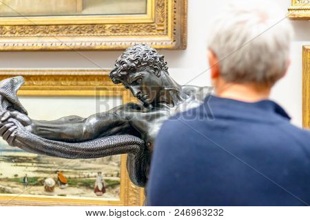 London, Uk - August 15, 2017 - A Visitor Admiring A Bronze Sculpture Displayed At Tate Britain