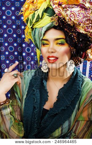 Beauty Bright Woman With Creative Bright Make Up, Many Shawls On Head Like Cubian, Ethno Look Closeu