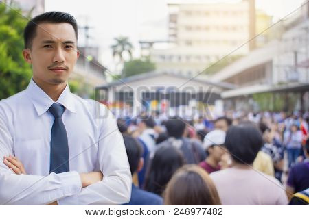 This Career Saleman Or Business Man Inspection With Building And Crowded People In City Blurry Backg