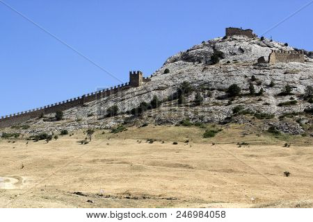 Genoese Fortress In Crimea, Sudak. Genoese Fortress And A Rock. Beatufull Landscape