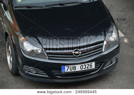 Chomutov, Czech Republic - June 23, 2018: Parked Black Car Opel Astra H With Headlights After Renova