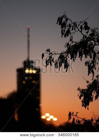 Image Of Big Tower With Street Lamps During Sunset In Augsburg, Bavaria, Germany