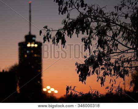 Image Of Big Tower With Street Lamps During Sunset In Augsburg, Bavaria, Germany