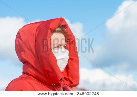 Woman Wearing Face Mask Because Of Air Pollution In The City