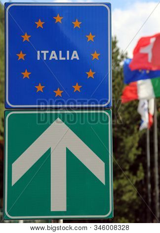 Blue Road Sign Indicating The Italian State Border