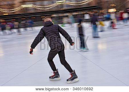 Skating On The Ice Rink.