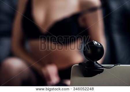 Selective Focus Of Seductive Girl In Black Bra Posing At Web Camera