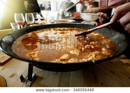 Paella Pan With Traditional Spanish Food Usually Prepared With Rice, Meat, Seafood