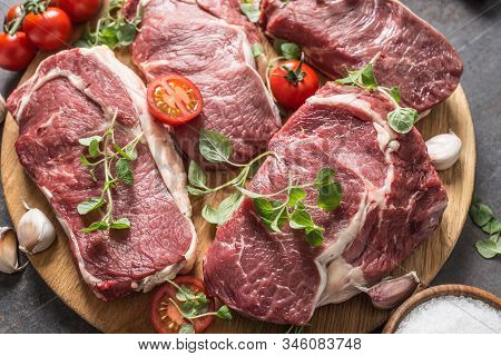 Beef Ribe Eye Steaks With Rosemary Oregano And Tomatoes.