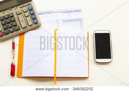 Credit Card Statement Due Expenses ,calculater ,notebook Planner And Mobile Phone For Business Work 
