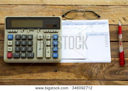 Credit Card Statement Due Expenses ,calculater For Business Work Arrangement At Office Desk On Backg